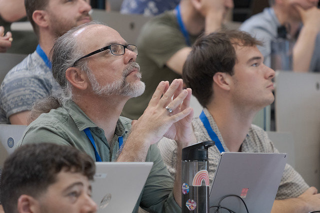GCC2026 attendees listening during a conference talk.